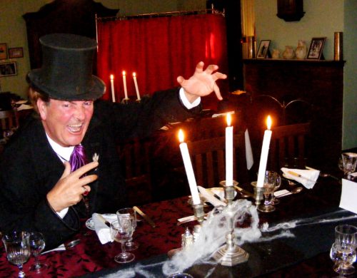 0 Mark Rose-Christie with red & gold Vaudeville spirit cabinet in background